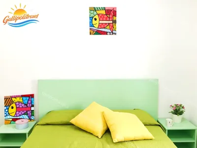 Cameretta verde quadri pesci, trilocale B2/2 al Residence Rosa Virginia, Gallipoli
