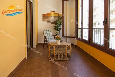 Veranda luminosa in un appartamento del Residence Rosa Virginia