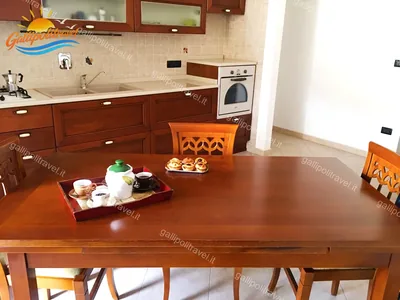 Cucina tavolo colazione, trilocale F3/2 al Residence Rosa Virginia, Gallipoli