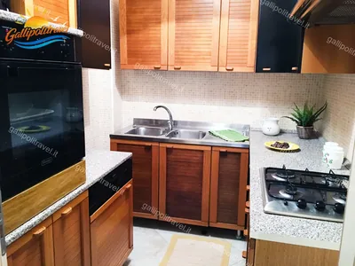 Cucina angolo granito forno delonghi, trilocale H2/2 al Residence Rosa Virginia, Gallipoli